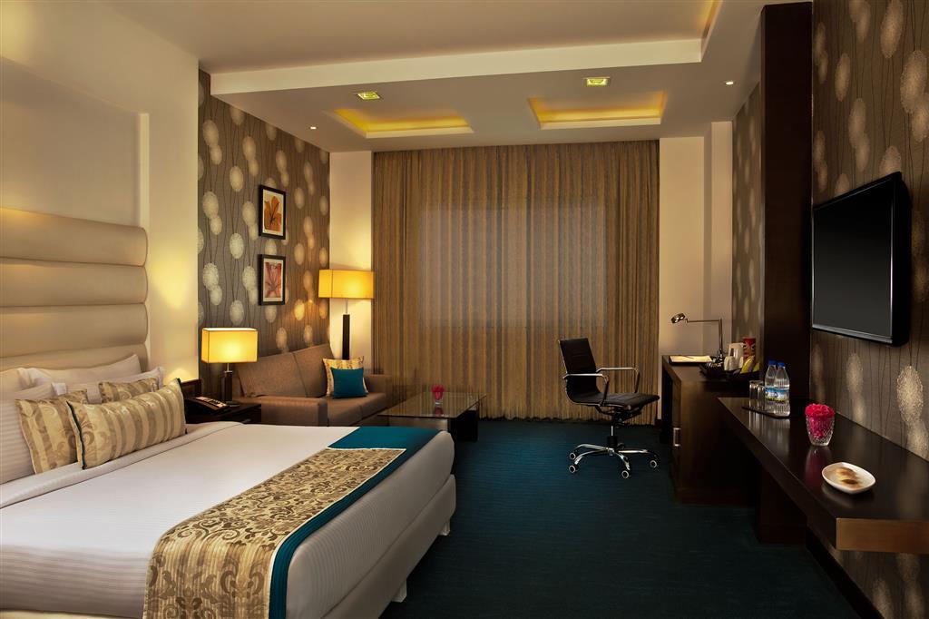 Golden Tulip Bhiwadi Hotell Rom bilde